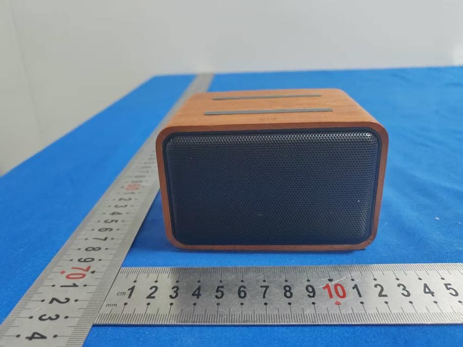 Wooden speaker with wireless charging - FCC ID 2ALCF-XO9672 - Dongguan Xing Yue Electronic co., Ltd (2)