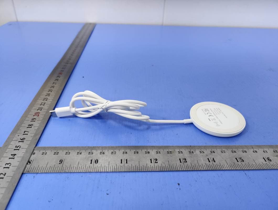 Wireless charger - FCC ID 2ALCFOT013-1 - Dongguan Xing Yue Electronic co., Ltd (4)