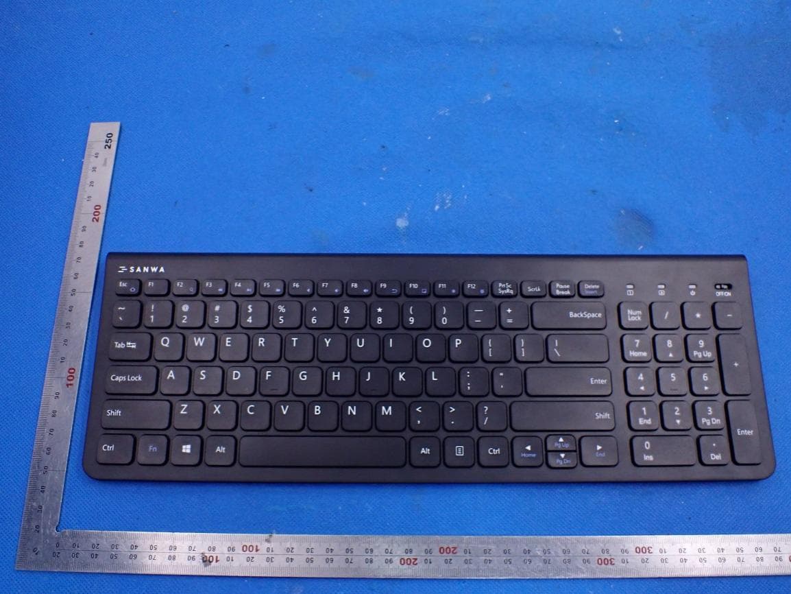 2.4G Wireless Keyboard - FCC ID 2AMSUW064E - SANWA LIMITED