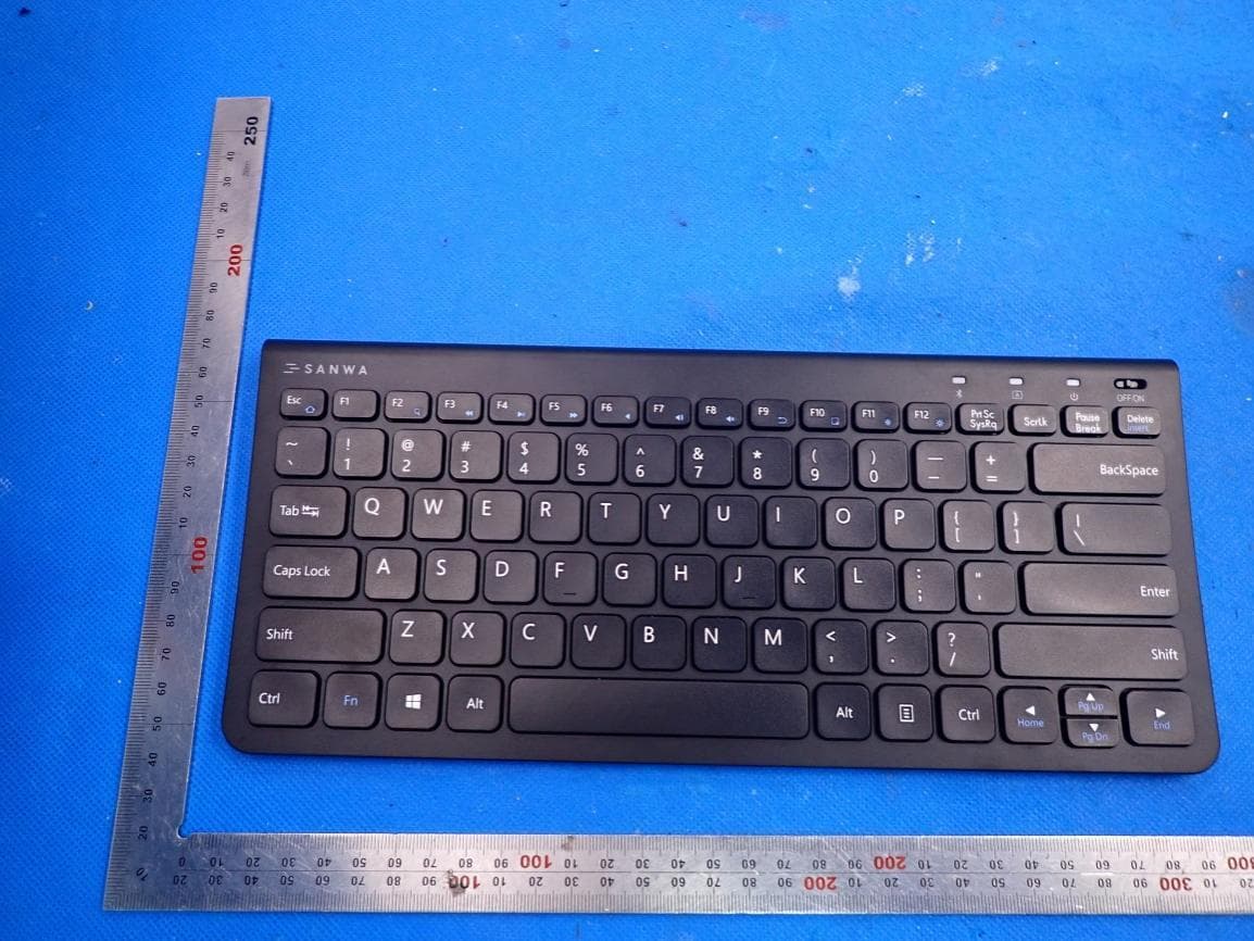 2.4G Wireless Keyboard - FCC ID 2AMSUW065E - SANWA LIMITED