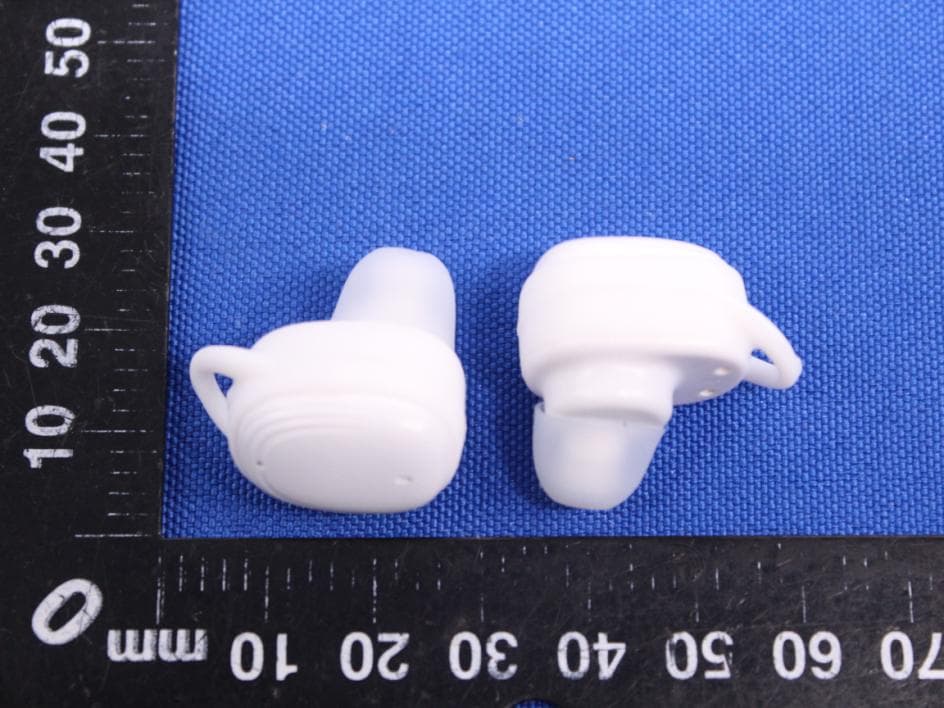 True wireless earbuds - FCC ID 2ANEUCHE-627 - Tra Company Ltd