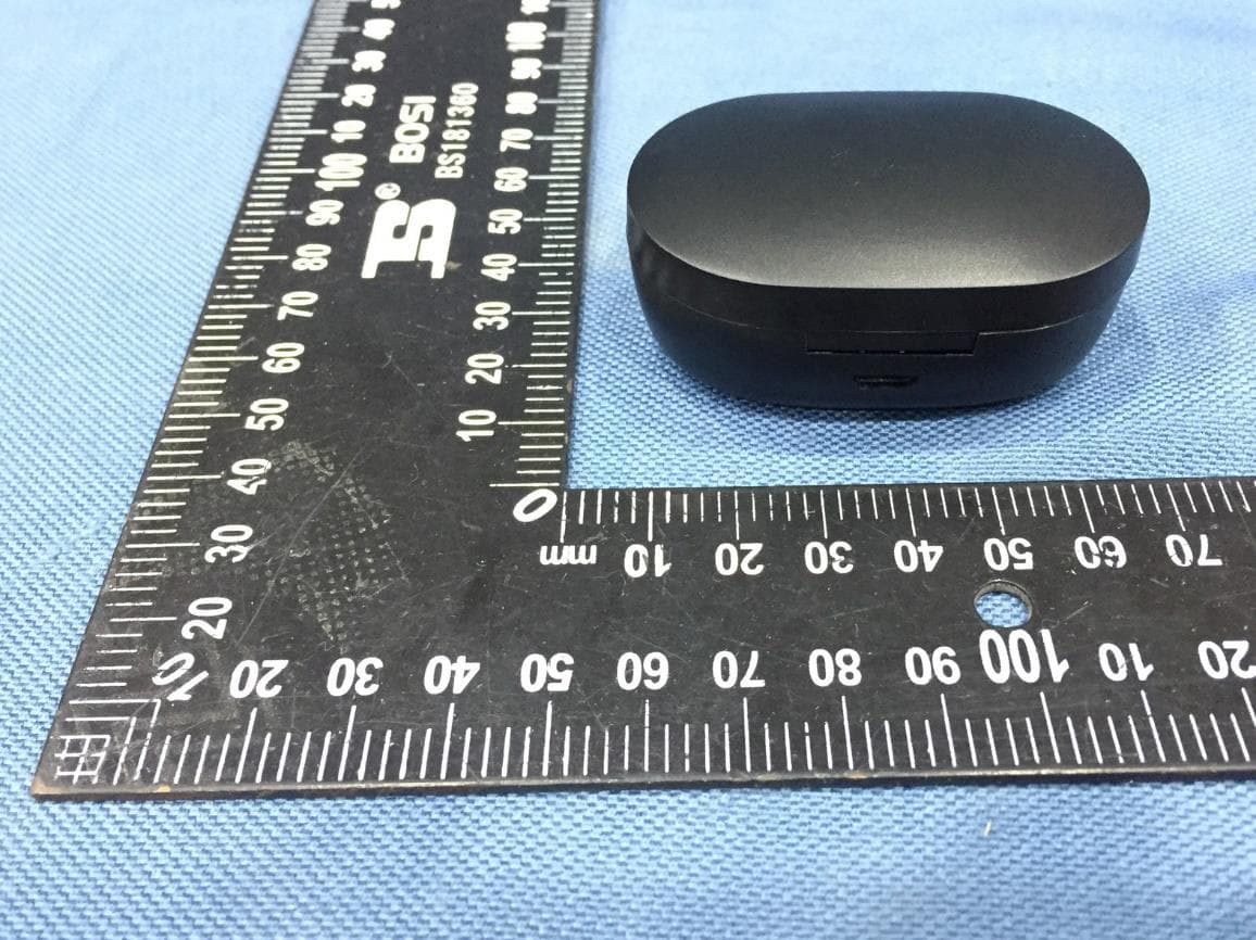 TWS Earbuds with charging case - FCC ID 2AO23-TWS06 - Chug, Inc. (4)