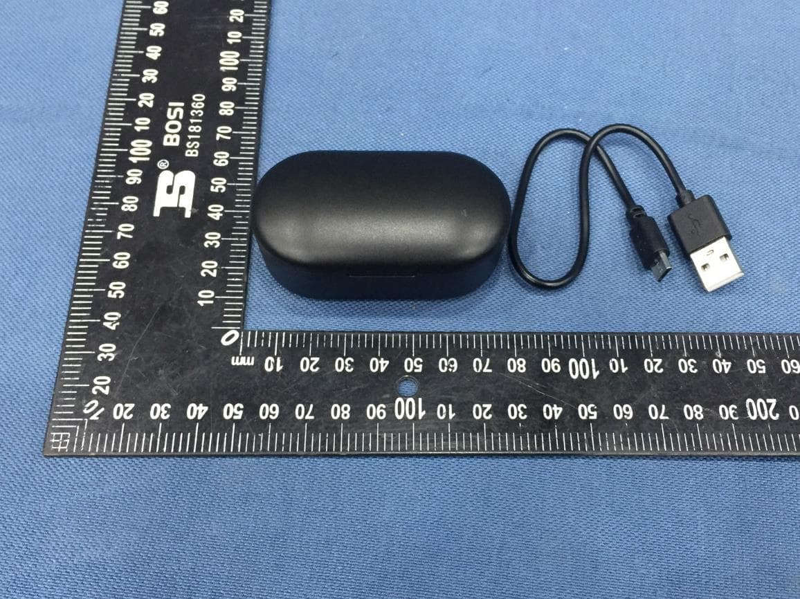 TWS earbuds with charging case - FCC ID 2AO23-TWS07 - Chug, Inc.