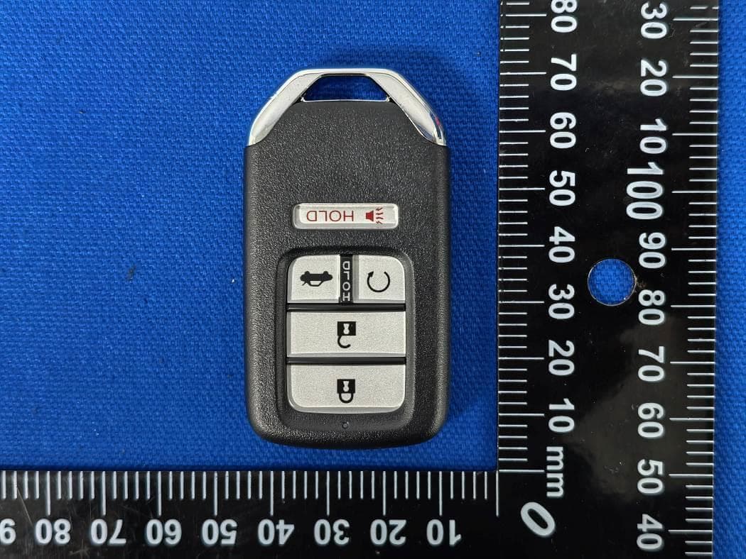 Smart Key - FCC ID 2AOKM-HD09B - Remote Tech LLC (2)