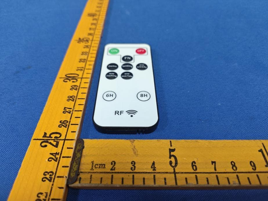 RF Remote Control used for Christmas trees, wreaths or garlands - FCC ID 2AOPF-433-5 - Terry Electronics Technology Company Limited (4)