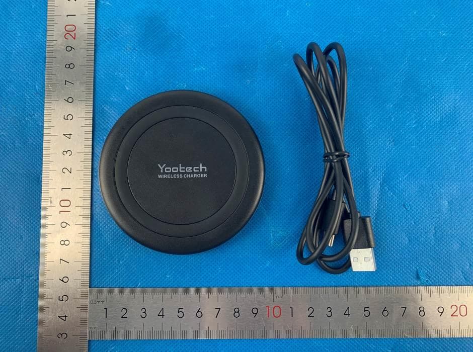 Wireless Charging Pad - FCC ID 2AOSURC400 - ShenZhen KaiXingHui Technology Co.,Ltd.
