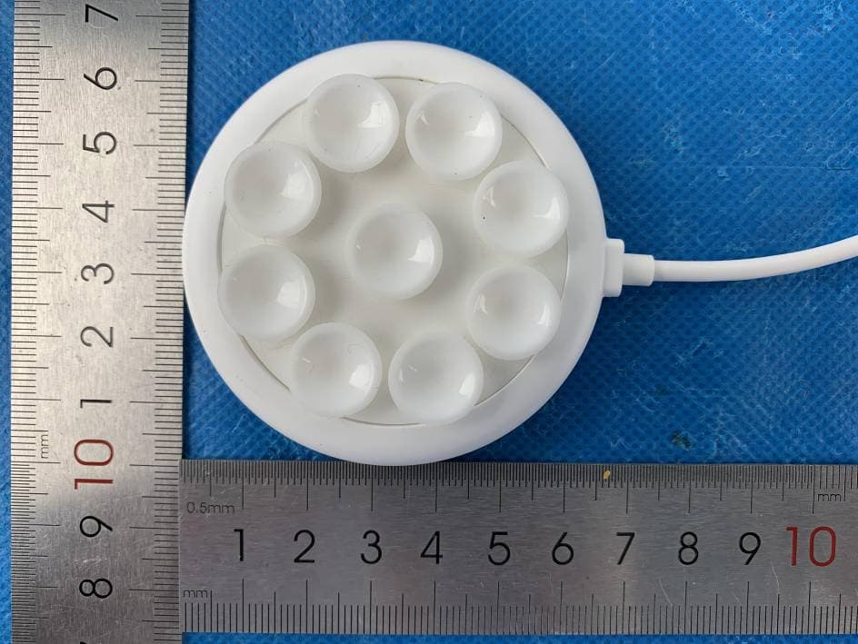 Mini Wireless Charger with Suction-cups - FCC ID 2AP2N-QOO - Shenzhen Esorun Technology Co.,LTD (4)