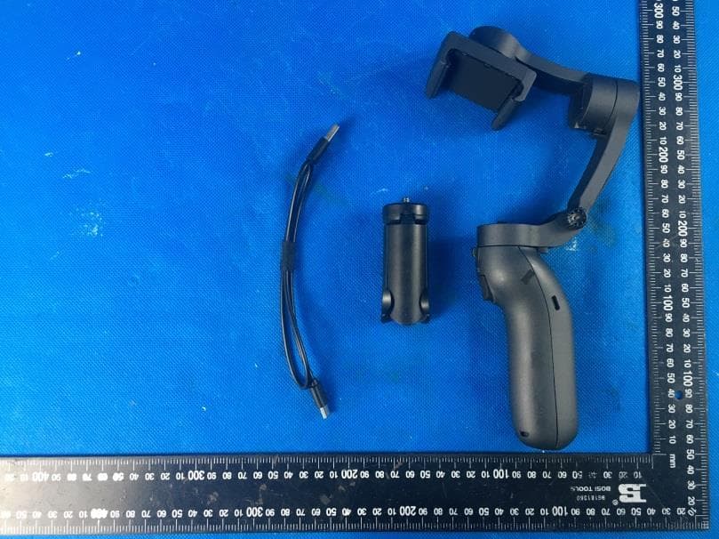 Foldable 3 axis gimbal stabilizer - FCC ID 2APQ9-L7-1 - Shenzhen JX ROBOT Technology Co., Ltd. (3)
