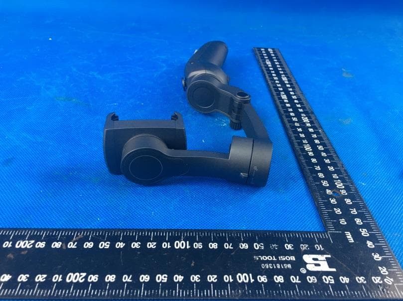 Foldable 3 axis gimbal stabilizer - FCC ID 2APQ9-L7-1 - Shenzhen JX ROBOT Technology Co., Ltd. (4)