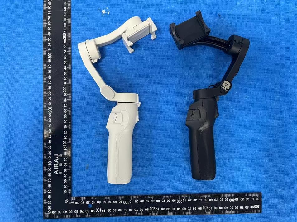 3 axis foldable gimbal - FCC ID 2APQ9-L9-LITE - Shenzhen JX ROBOT Technology Co., Ltd. (3)