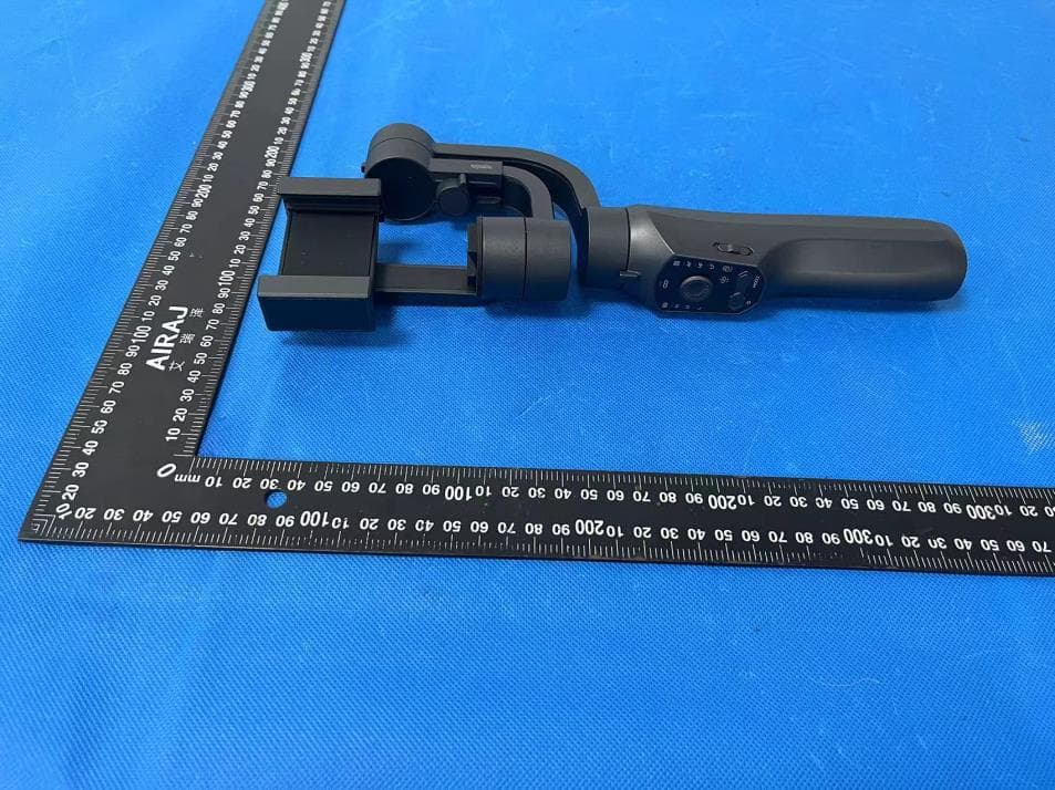 Handheld 3-axis Gimbal Stabilizer - FCC ID 2APQ9-S5C - Shenzhen JX ROBOT Technology Co., Ltd. (4)