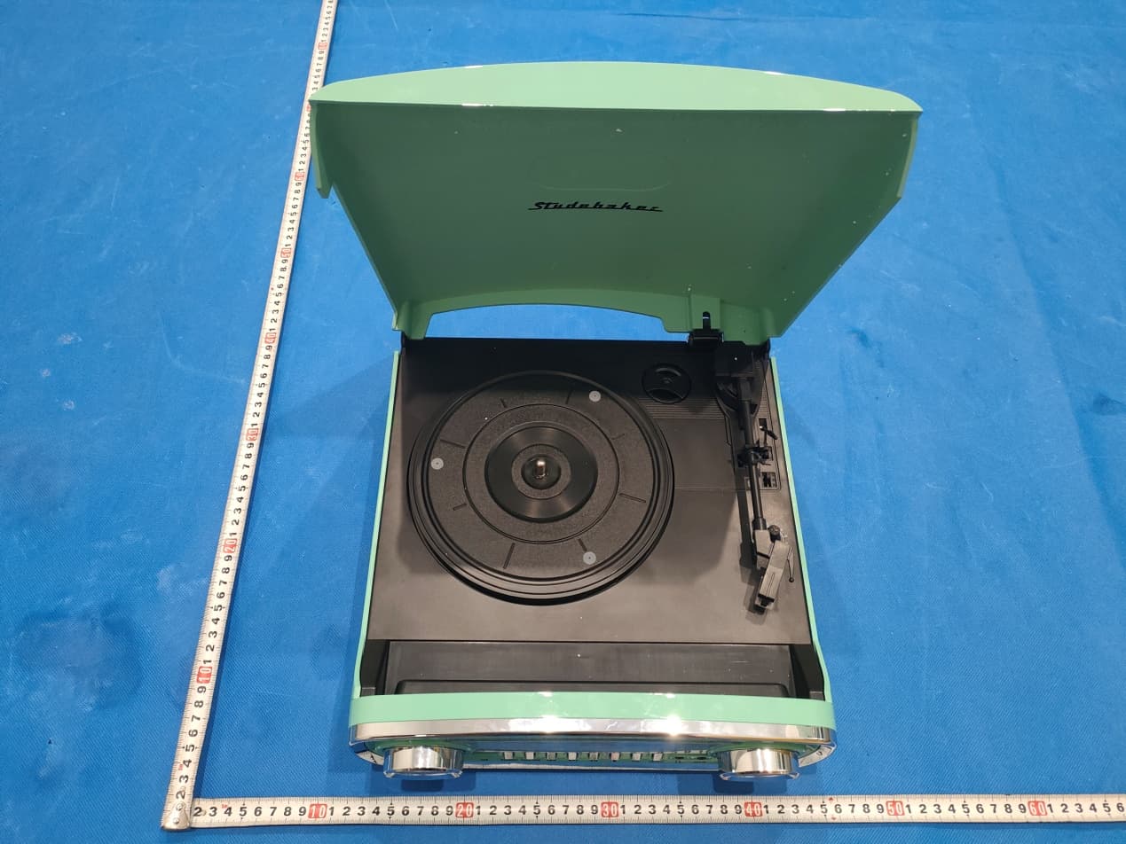 3 Speed Stereo Turntable with AM/FM Stereo Radio and Bluetooth Receiver - FCC ID 2AQ7H-SB6057 - Trinovae Development (HK) Co., Ltd.