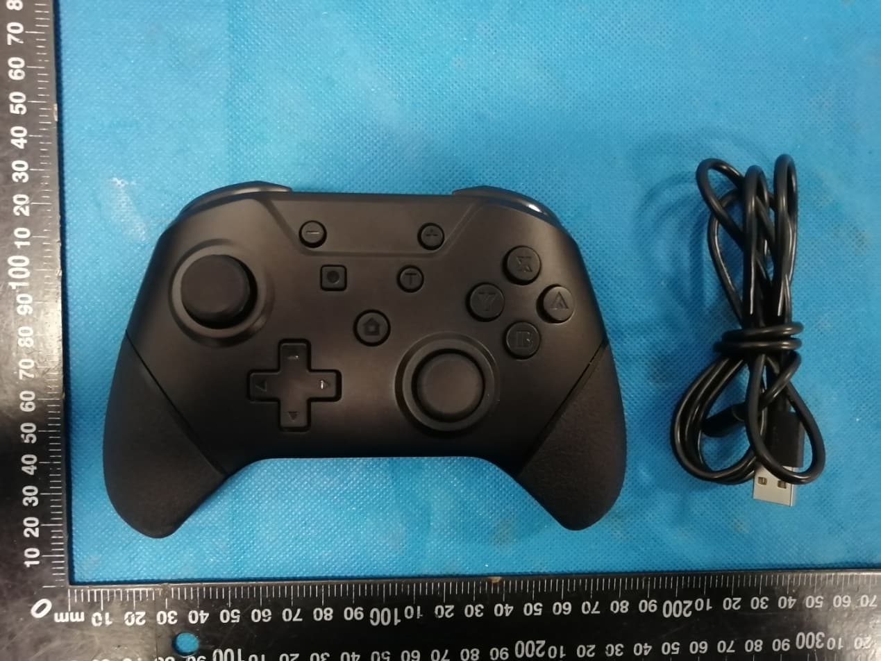NuChamp Wireless Game Controller For Nintendo SwitchR - Armor3 - FCC ID 2ARNF-M07467 - Hyperkin,inc