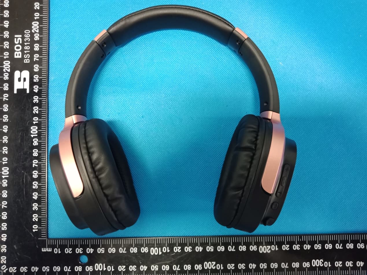 Bluetooth Headphone - FCC ID 2ARUI-KKWEEN - American Exchange Time LLC