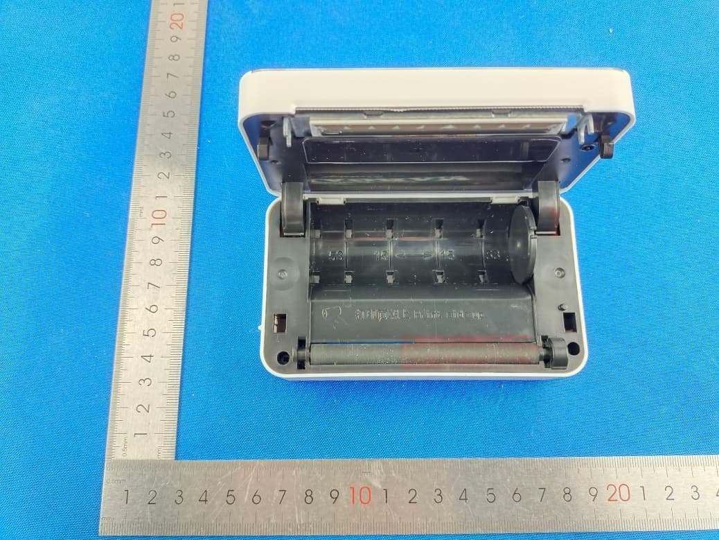 Mini Printer - FCC ID 2ASRB-M03A - Zhuhai Quin Technology Co., Ltd.