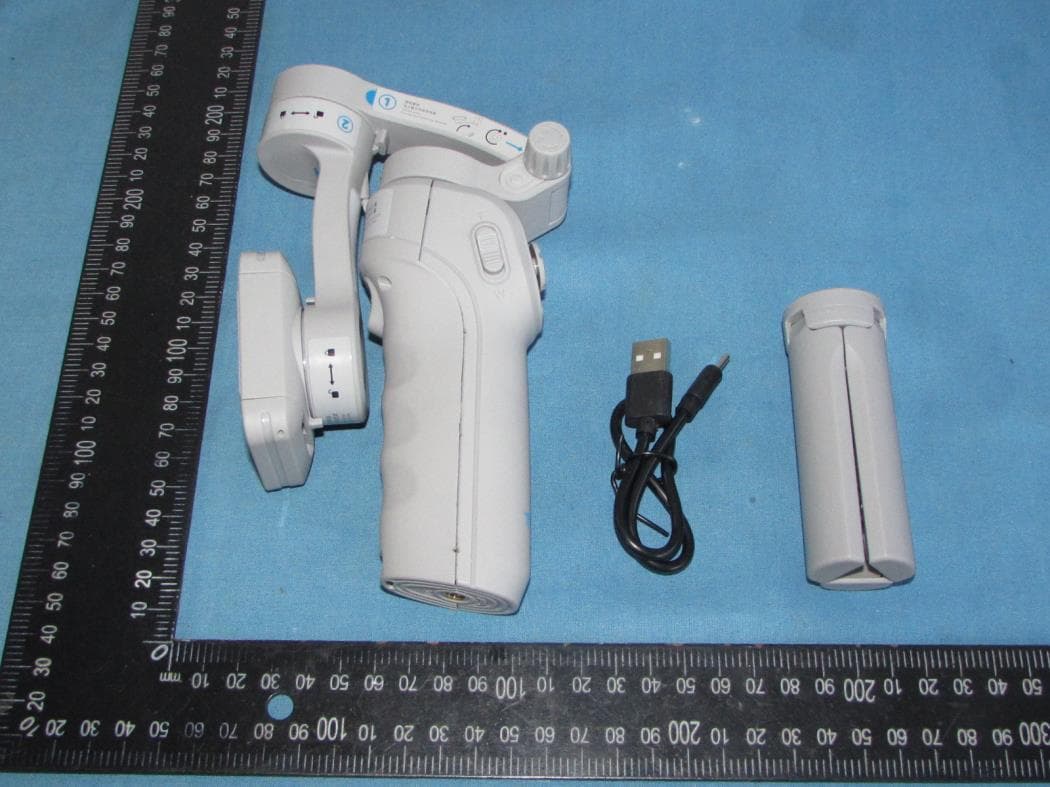 3-AXIS GIMBAL STABILIZER - FCC ID 2ASXW-M01 - SHENZHEN YUANSU CHUANGDA TECHNOLOGY CO., LTD