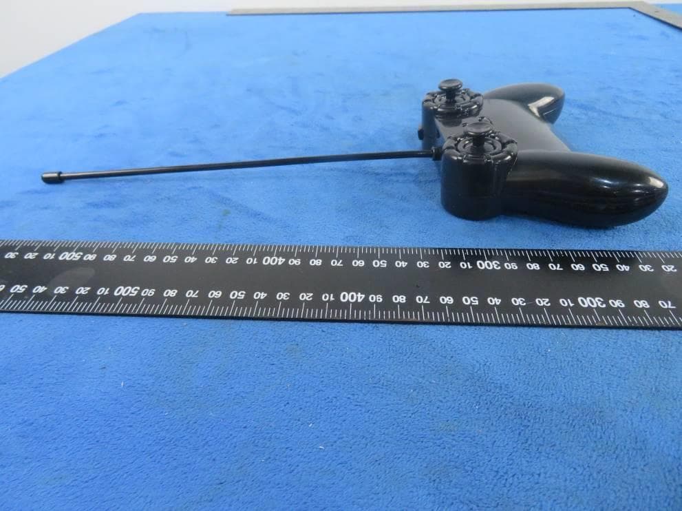 Toy RC Flip Stunt Rally - FCC ID 2ASYF-UZL41627727F - FU WING HONG COMPANY LIMITED (4)