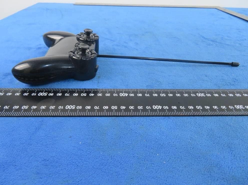 Toy RC Flip Stunt Rally - FCC ID 2ASYF-UZL41627727F - FU WING HONG COMPANY LIMITED (3)