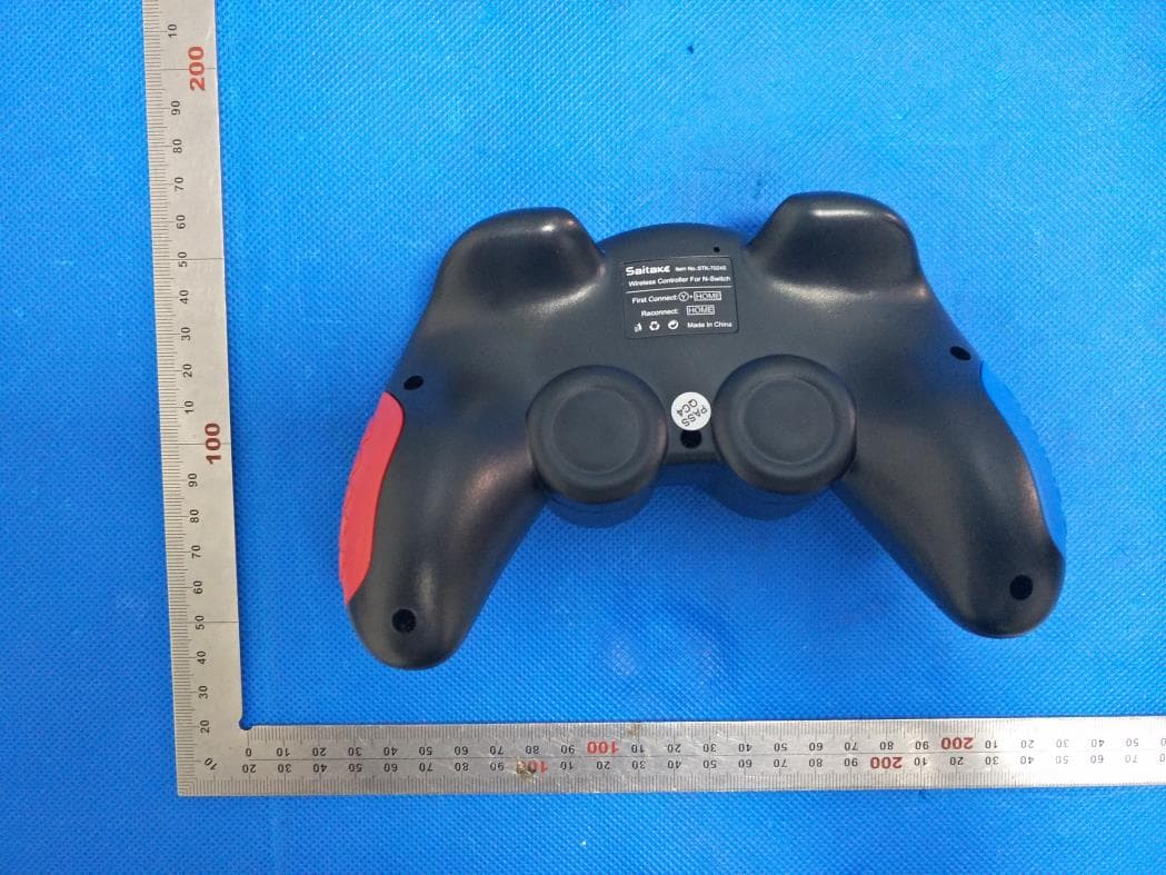 SWITCH WIRELESS GAMEPAD - FCC ID 2ATI7STK-7024S - SHENZHEN SAITAKE ELECTRONIC CO.,LTD. (2)