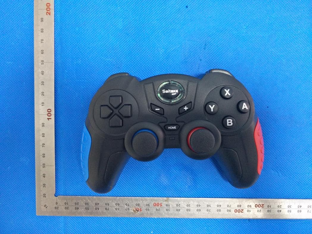 SWITCH WIRELESS GAMEPAD - FCC ID 2ATI7STK-7024S - SHENZHEN SAITAKE ELECTRONIC CO.,LTD.