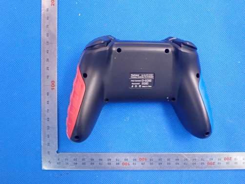SWITCH WIRELESS GAMEPAD - FCC ID 2ATI7STK-7033SN - SHENZHEN SAITAKE ELECTRONIC CO.,LTD.