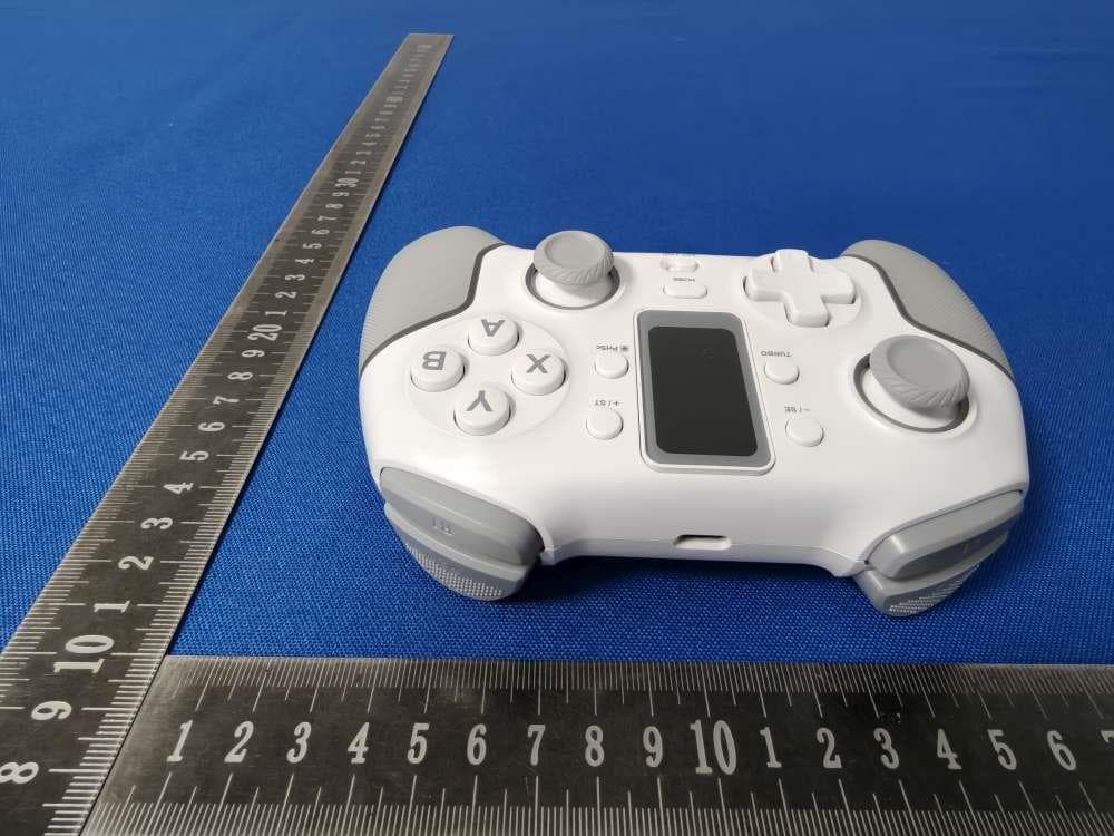 Multi-Function Game Controller - FCC ID 2ATI7STK-7052PD - SHENZHEN SAITAKE ELECTRONIC CO.,LTD. (3)