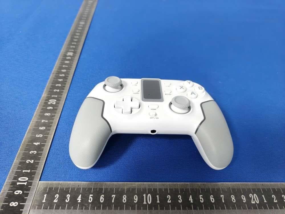 Multi-Function Game Controller - FCC ID 2ATI7STK-7052PD - SHENZHEN SAITAKE ELECTRONIC CO.,LTD. (5)