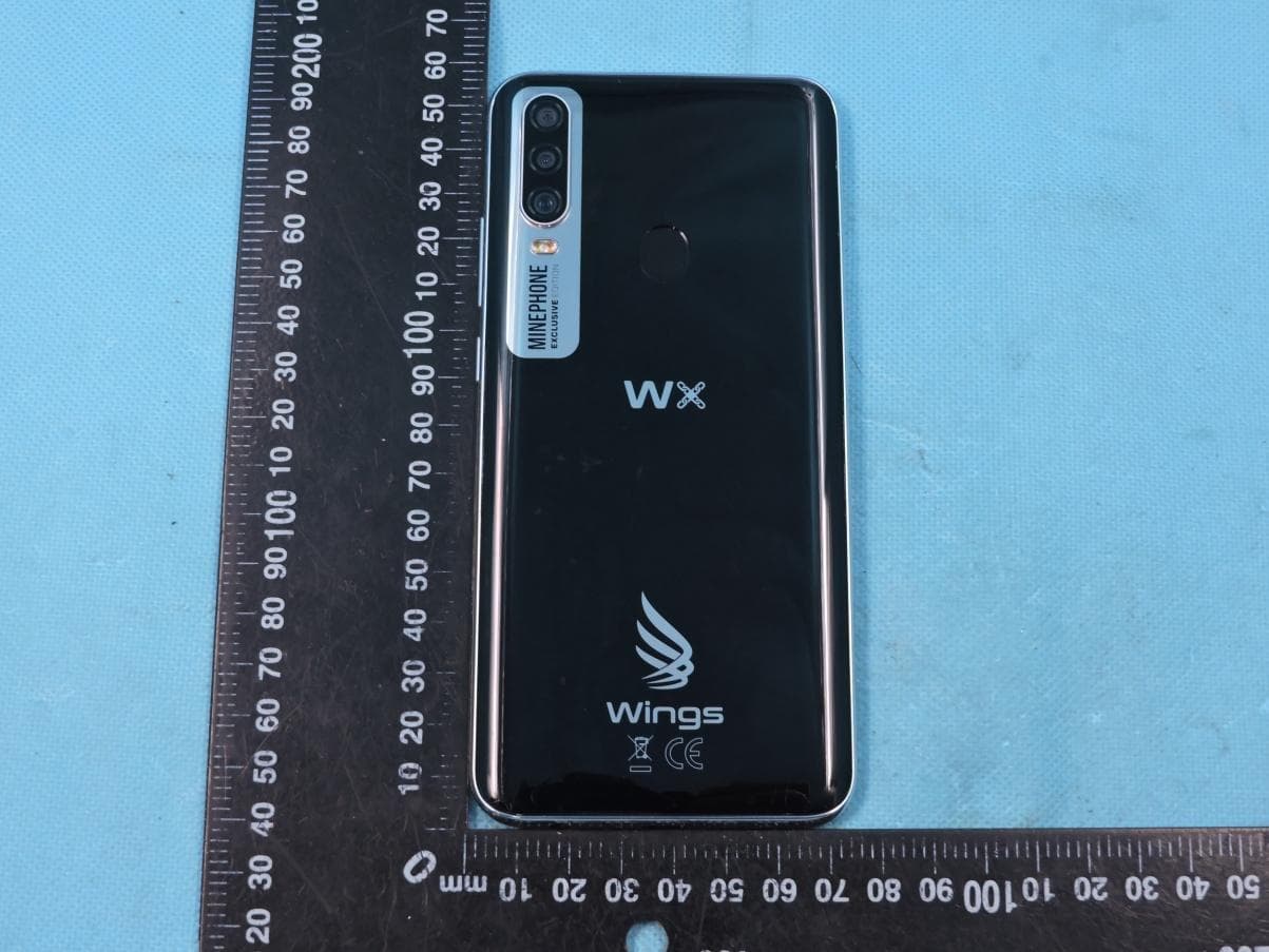 Smart Phone - FCC ID 2ATQIWX - Wings Mobile Telecom SL (4)