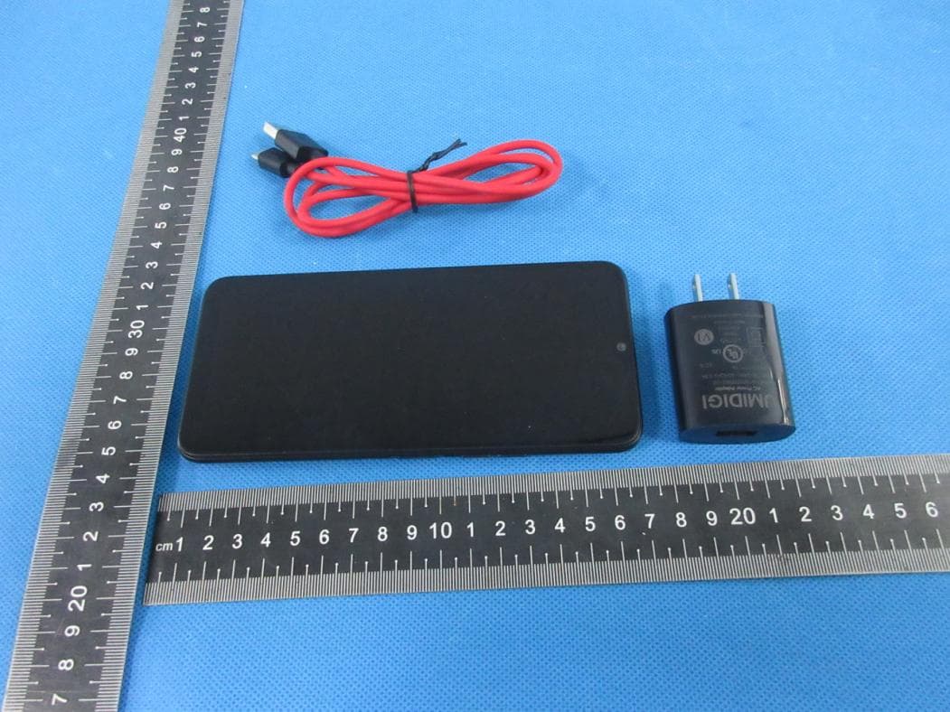 mobile phone - FCC ID 2ATZ4-G1C1F - Shenzhen Youmi Intelligent Technology Co., Ltd. (3)