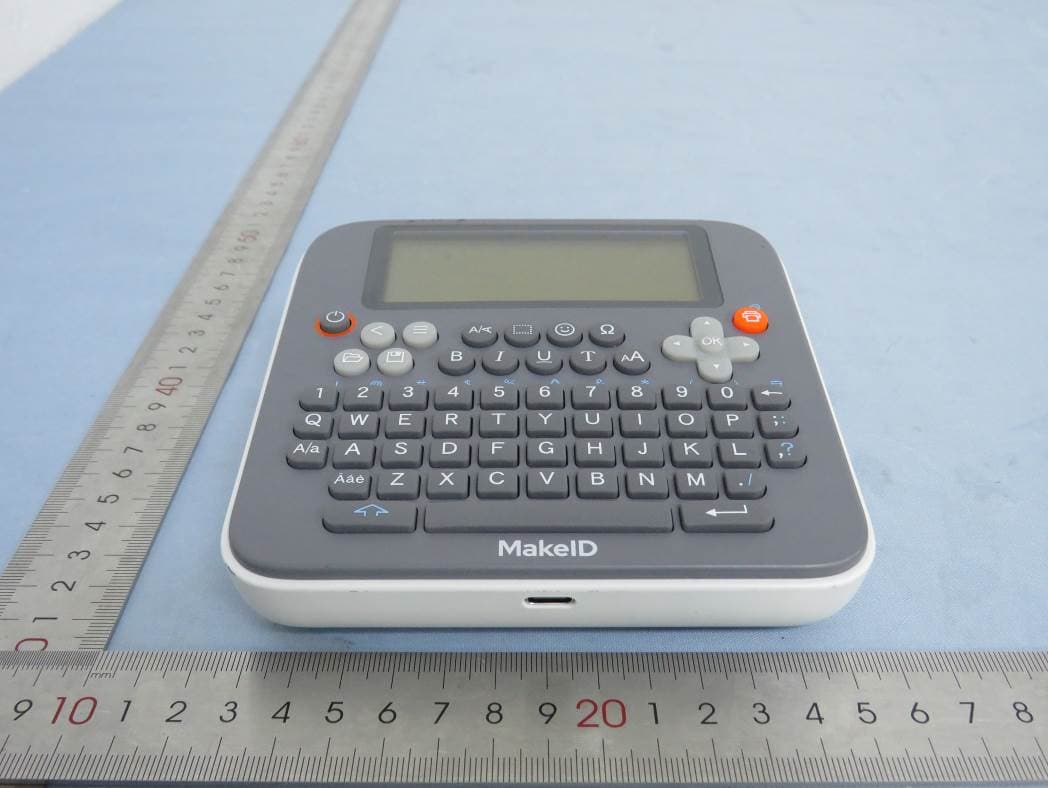 Label Printer - FCC ID 2AUMQ-E1 - Chongqing Jingranyouxu Technology Co., Ltd.