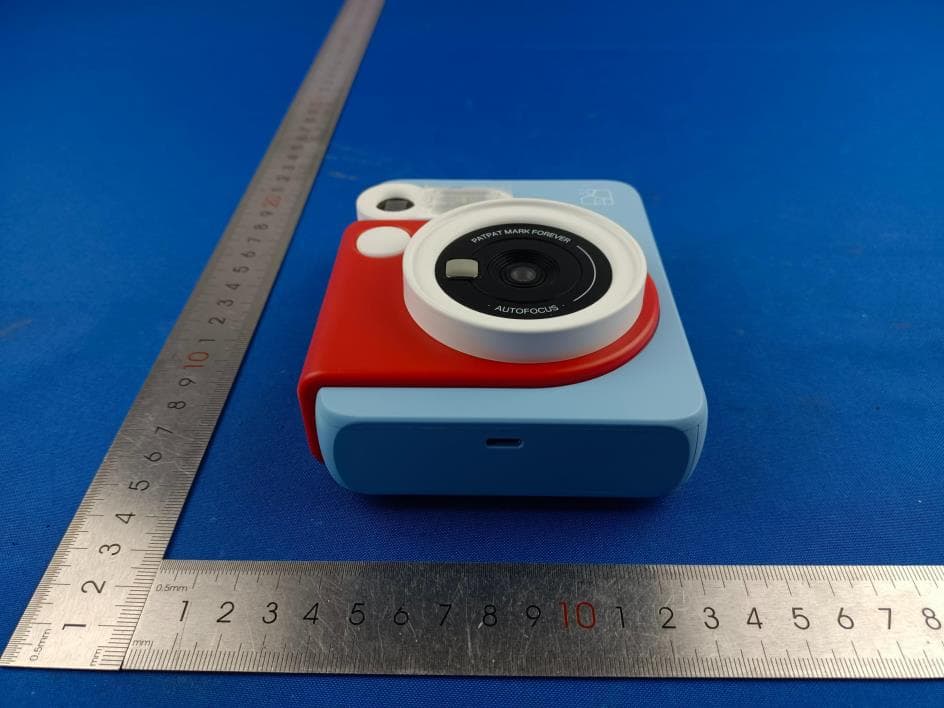 Portable Photo Printer, INSTANT CAMERA - FCC ID 2AUTE-2TS25G - Xiamen Hanin Co.,Ltd. (4)