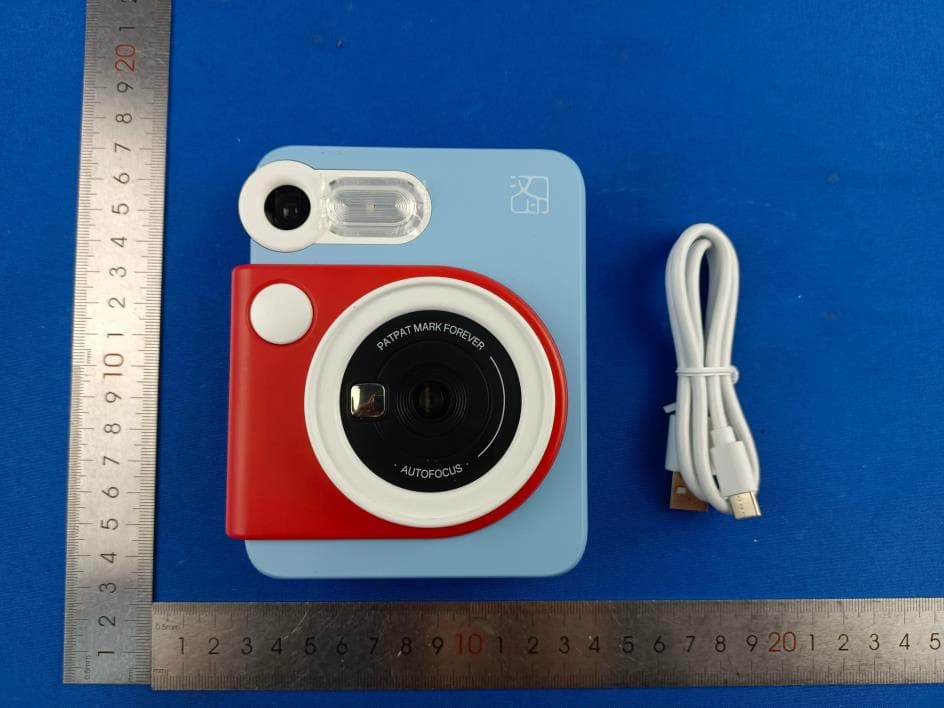 Portable Photo Printer, INSTANT CAMERA - FCC ID 2AUTE-2TS25G - Xiamen Hanin Co.,Ltd. (5)