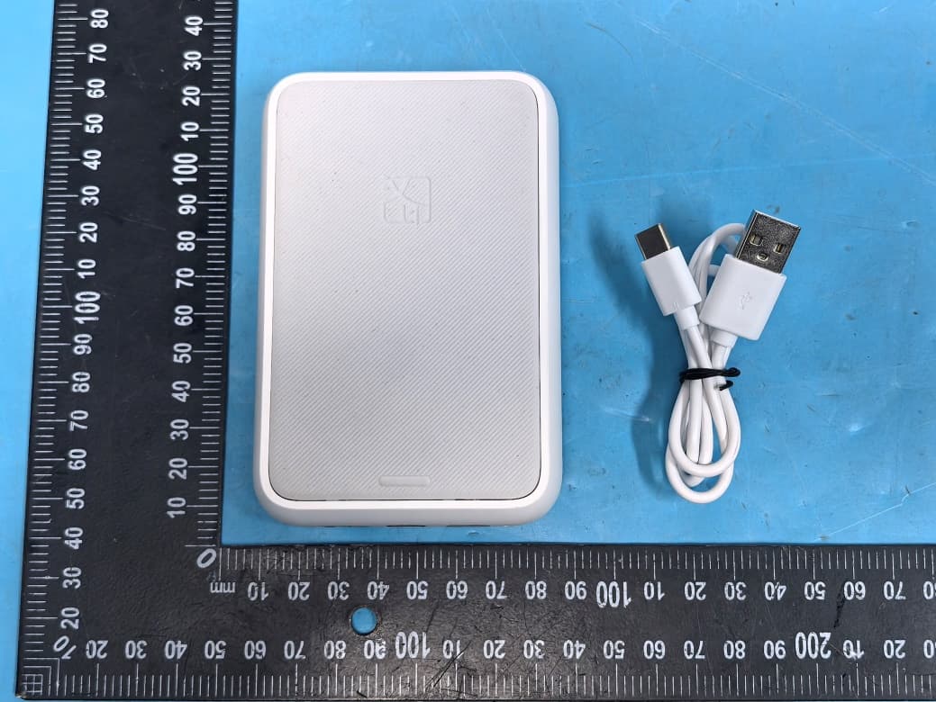 Portable Photo Printer - FCC ID 2AUTE-2ZK25H - Xiamen Hanin Co.,Ltd.