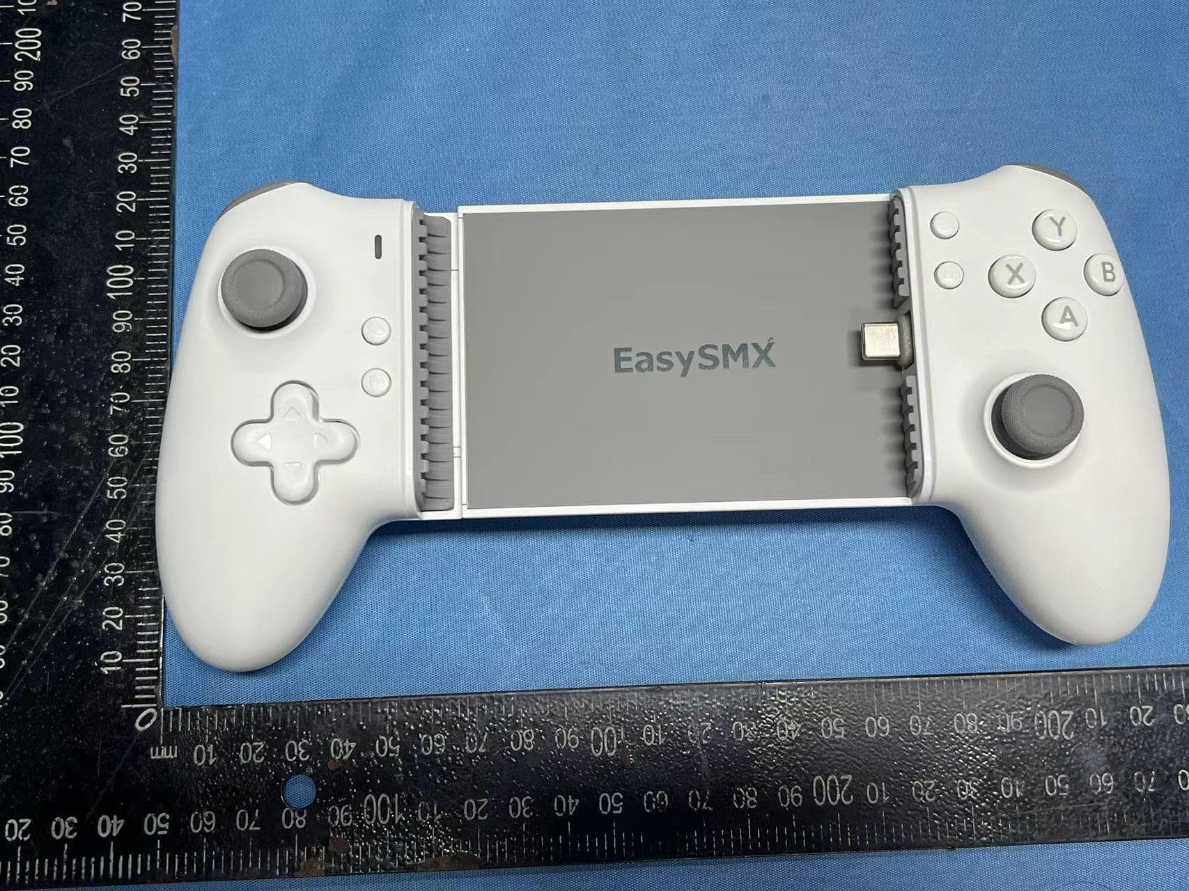 EasySMK M15 mobile game controller - FCC ID 2AUZP-M15 - Shenzhen Yisuma Network Technology Co ., LTD