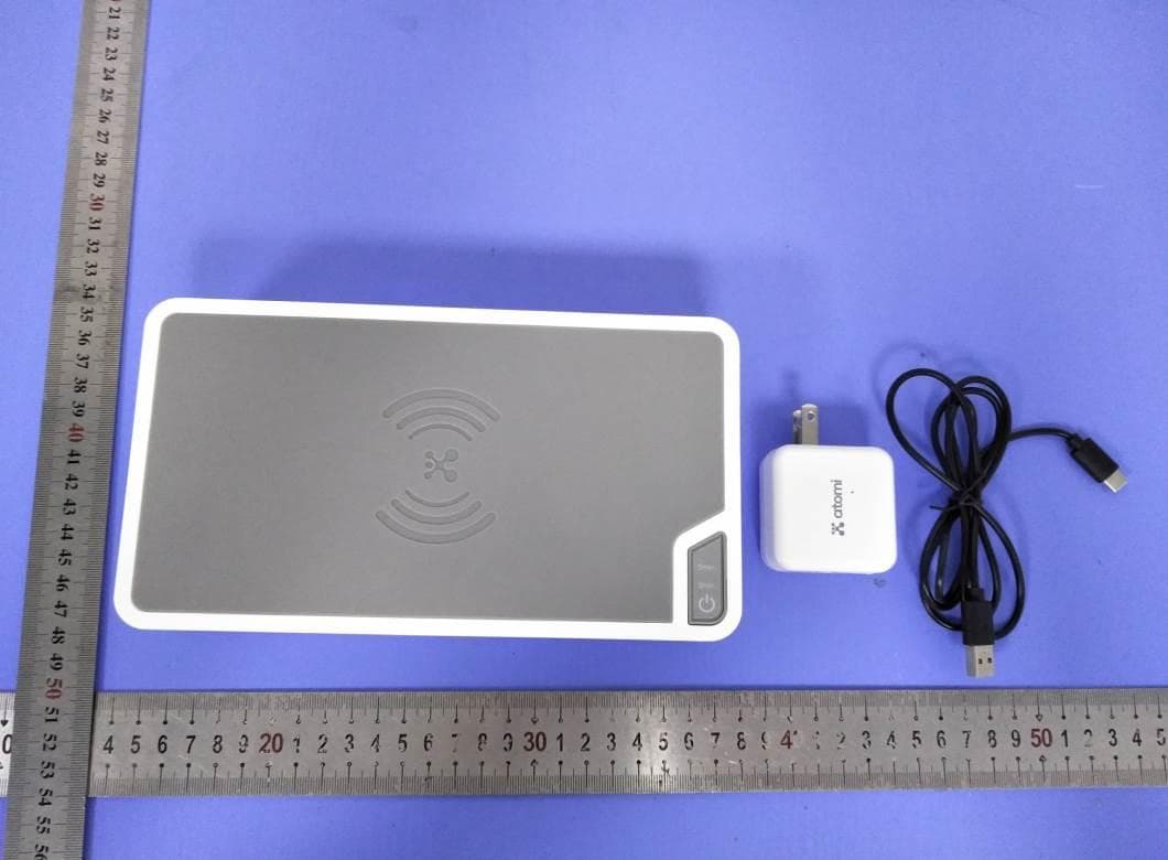 Atomi cell Phone UV sanitizer(Qi Charger) - FCC ID 2AVCH-AT1502 - Guangdong Bekey Technology Co.,Ltd. (2)