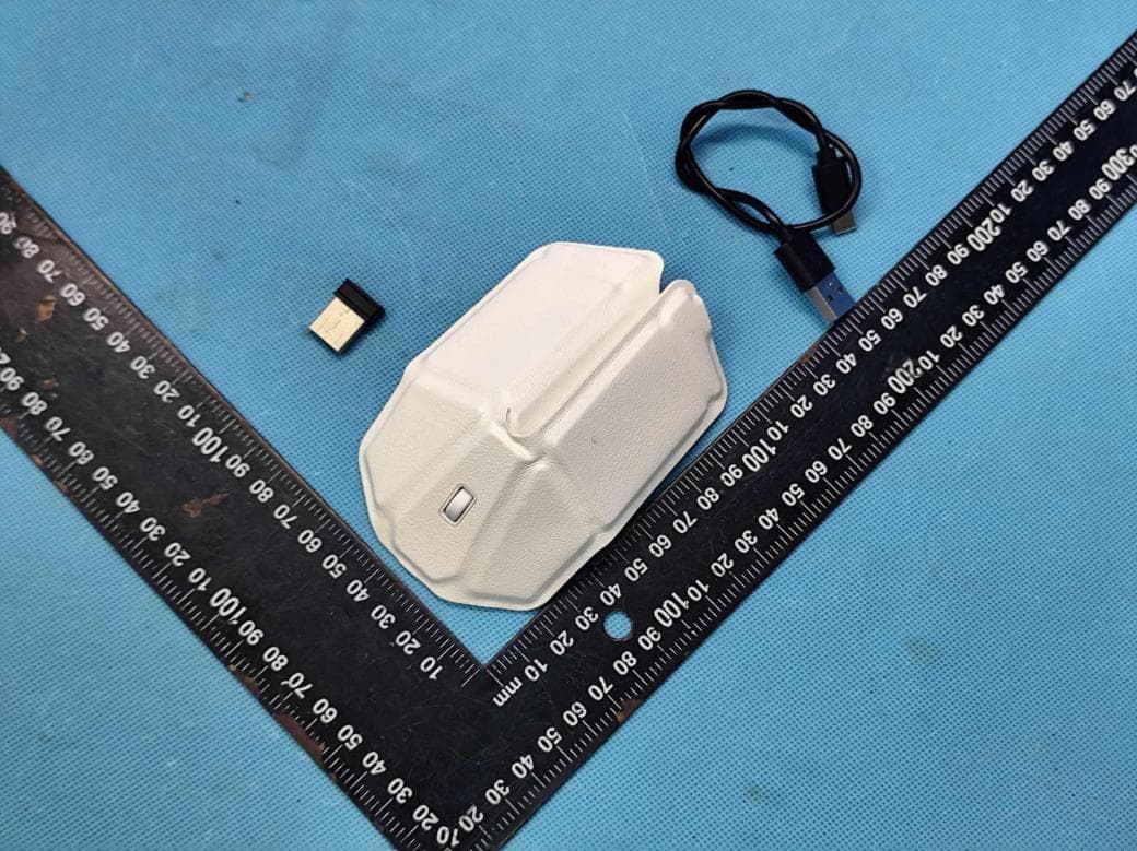 FOLDABLE LEATHER WIRELESS MOUSE - FCC ID 2AVCL-PM001 - LogoIncluded, Inc.
