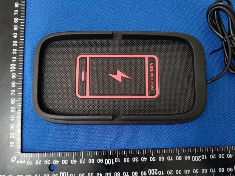 WIRELESS CHARGER - FCC ID 2AVI6-UT-19 - JE DEVELOPMENT GROUPLIMITED