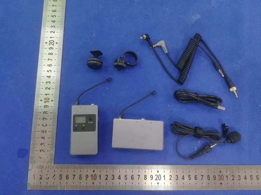 Wireless microphone - FCC ID 2AVXN-KW-M01 - Shenzhen Travor Technology Co, Ltd. (5)