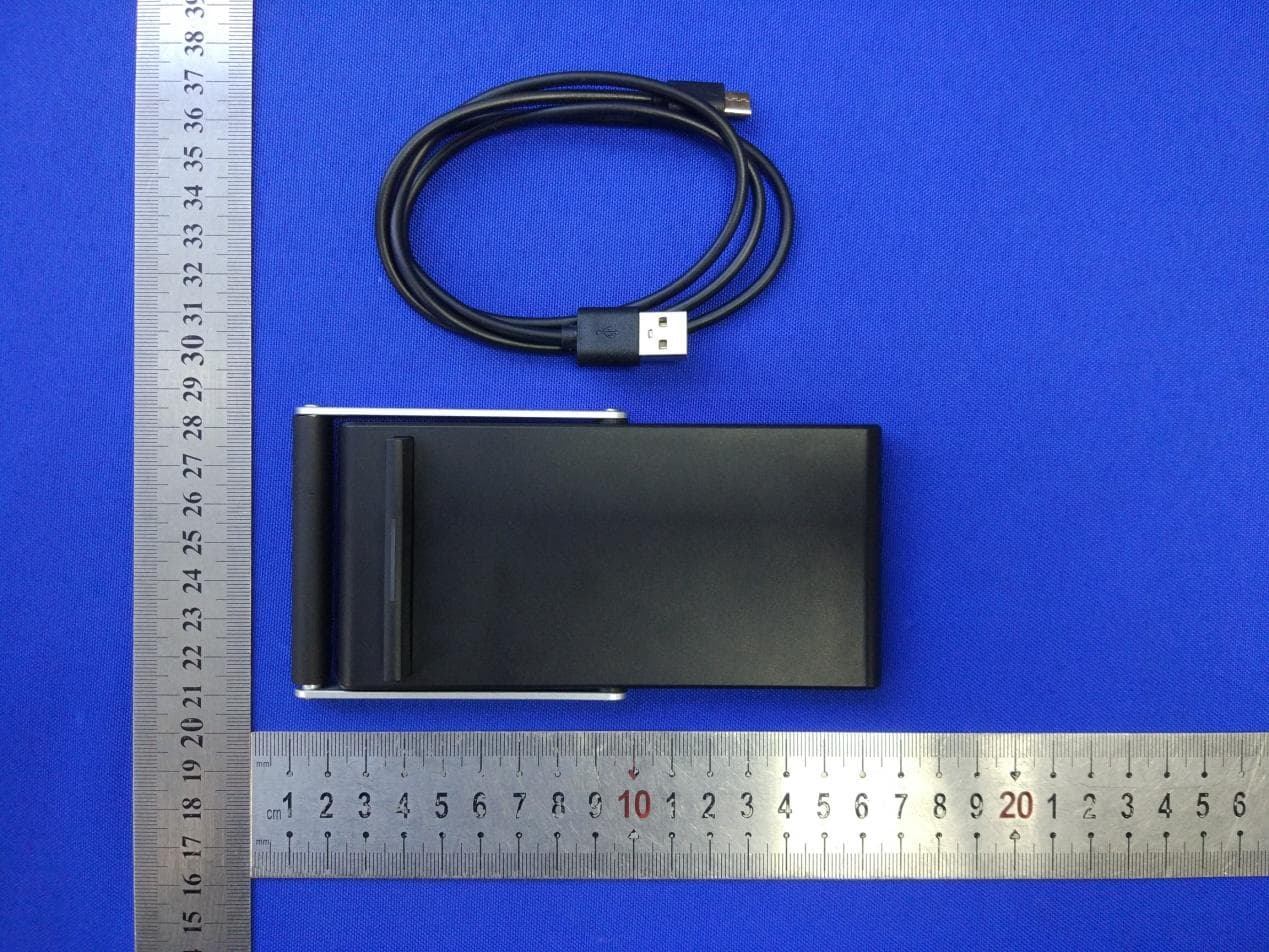 Vehicle wireless charging bracket - FCC ID 2AWF9-GBD02A - ShenZhenshi GYBB Technology Co., Ltd.