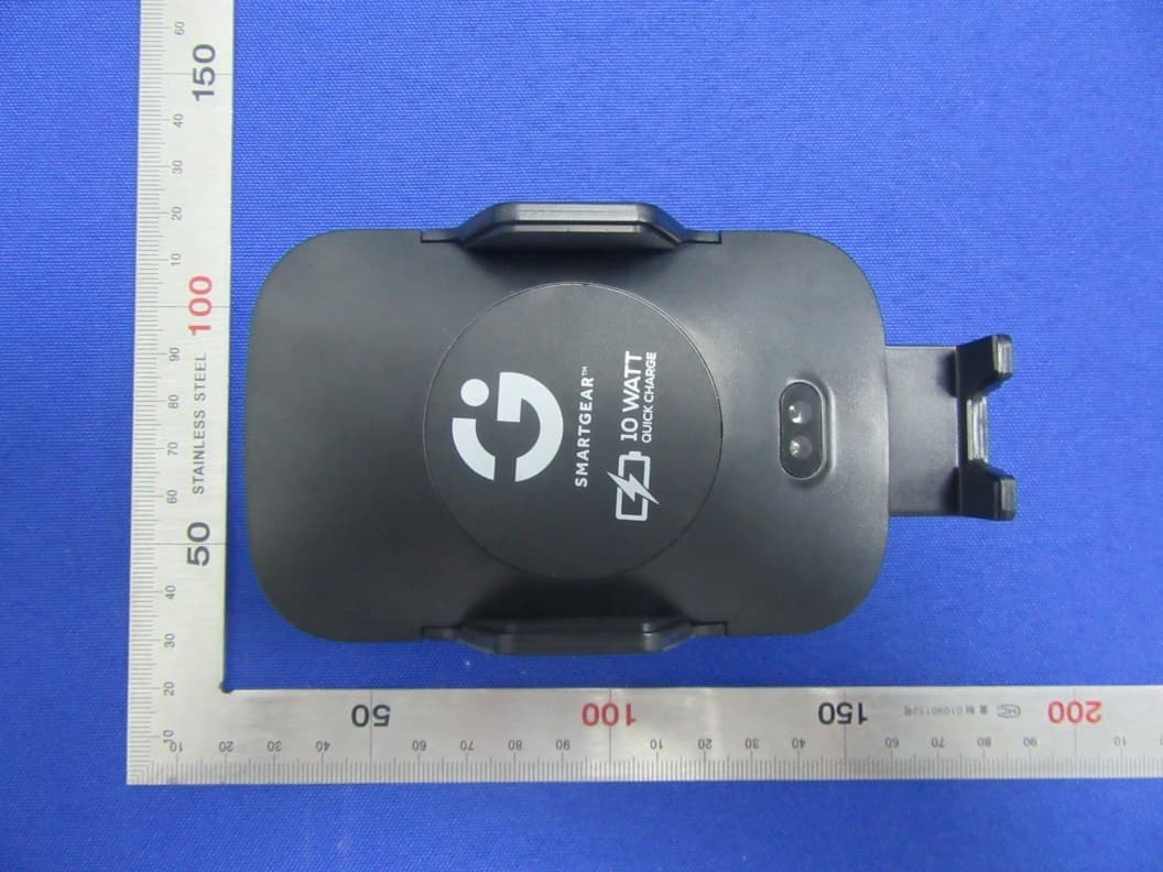 Infrared induction wireless charging support - FCC ID 2AWY4STG-6668-KB - Shenzhen Pinjinda Electronics Technology Co., Ltd (2)