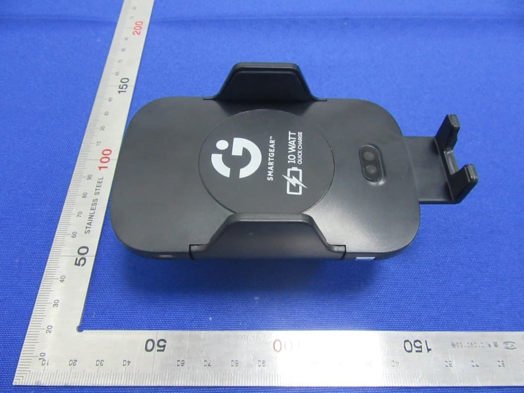Infrared induction wireless charging support - FCC ID 2AWY4STG-6668-KB - Shenzhen Pinjinda Electronics Technology Co., Ltd (4)