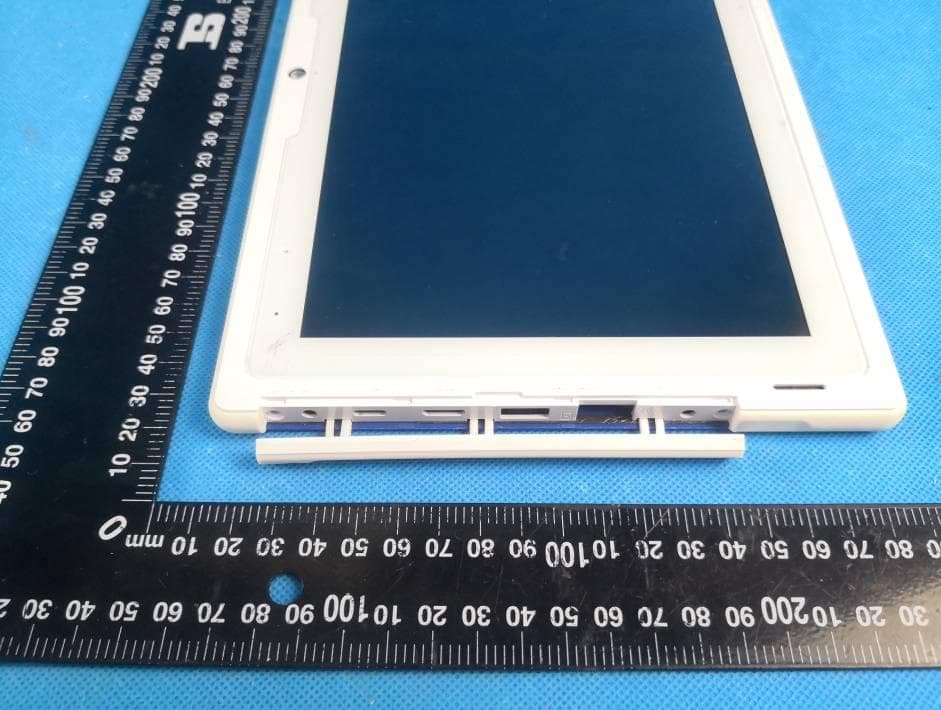 Tablet PC - FCC ID 2AWYT-TTBKB10 - TANOSHI INC (5)