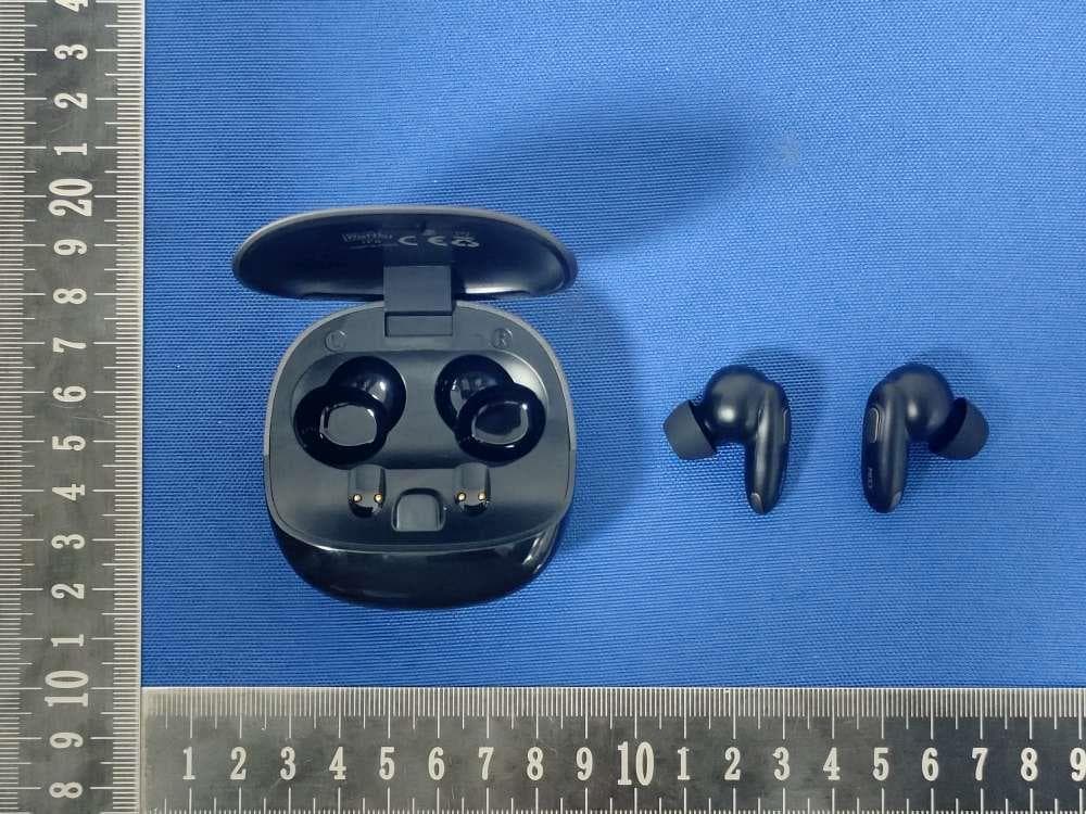 Bluetooth Wireless Earphone - FCC ID 2AXJ7-MINI - MIXX LIMITED