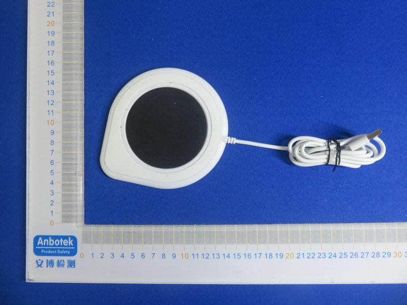 Wireless charger - FCC ID 2AYFW-QTO402 - Shenzhen Qi Quick Technology Company Limited