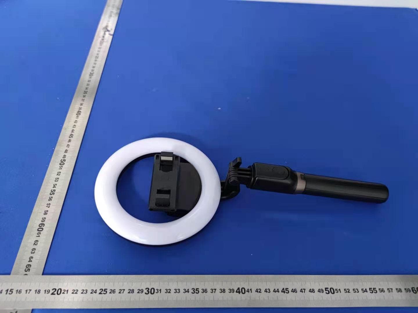 Selfie stick - FCC ID 2AYSW-MJ07 - Dongguan Manxin Electronic Technology Co. , Ltd.