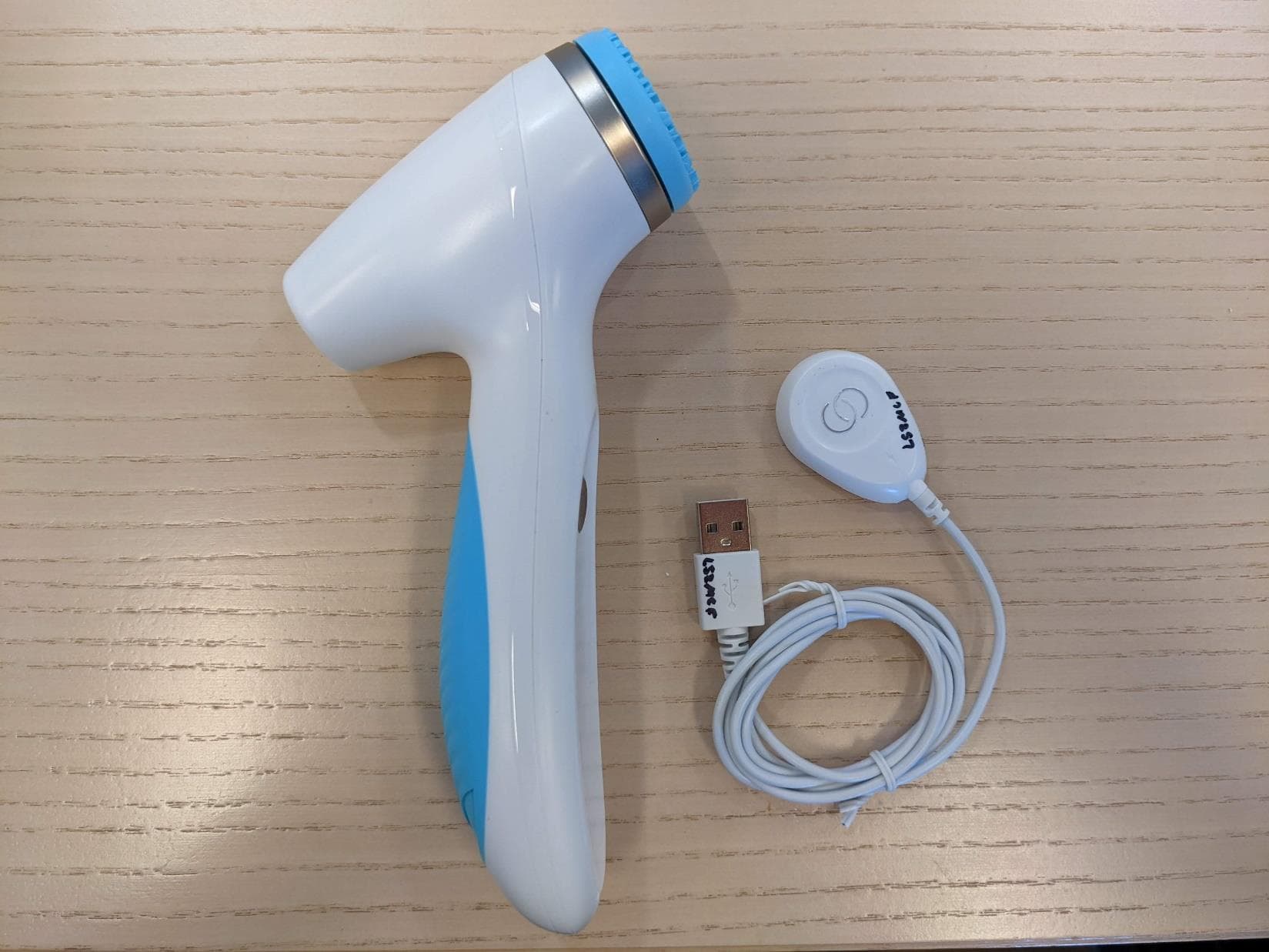 Facial cleansing and treatment skin care device - FCC ID 2AZ3A-LS2F - NSE Products, Inc.