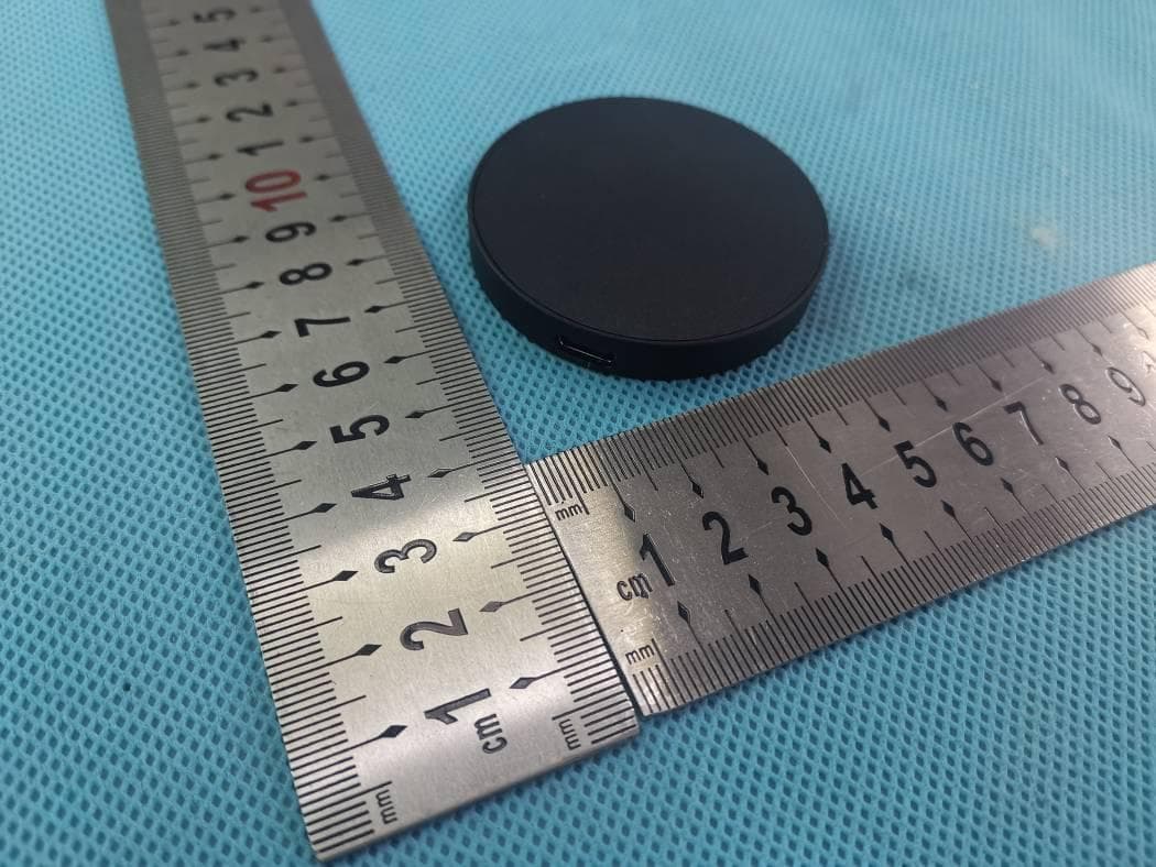 PUCK wireless charger - FCC ID 2AZ7I-TF-W01 - Dzine Products, LLC (3)