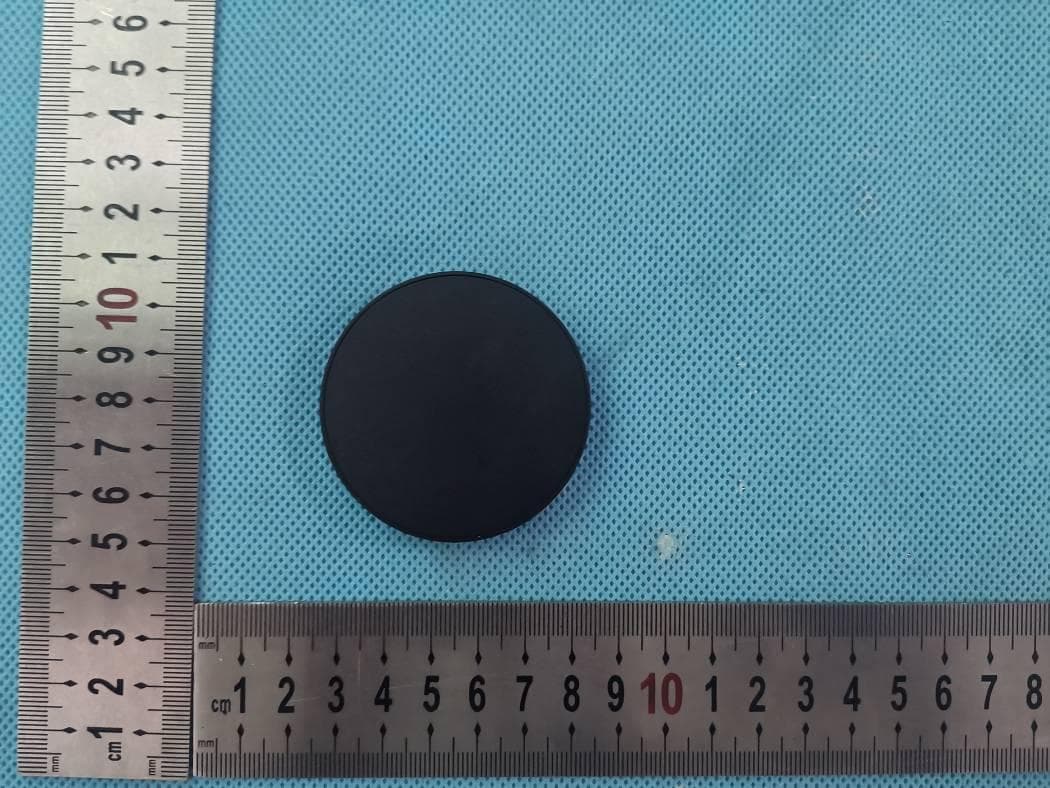 PUCK wireless charger - FCC ID 2AZ7I-TF-W01 - Dzine Products, LLC (2)