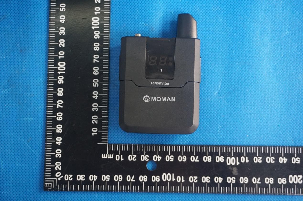 UHF Wireless Microphone - FCC ID 2AZKG-MTS - Moman Technology Limited (3)