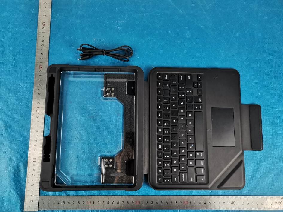 Dux Bluetooth Keyboard case - FCC ID 2AZL3-STM - Chun Lam Group (International) Limited (3)